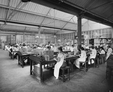 Cigarette production at the Teofani tobacco factory, Chryssel Road, Brixton, London, September 1916. Artist: H Bedford Lemere.