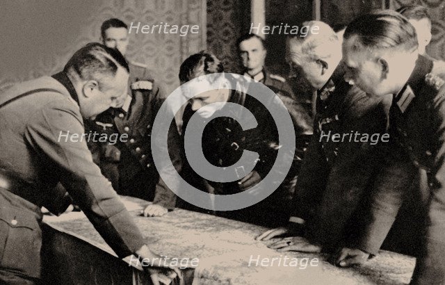 General Heinz Guderian (2nd from right) and the Red Army commissar Borovensky (3nd from right) durin