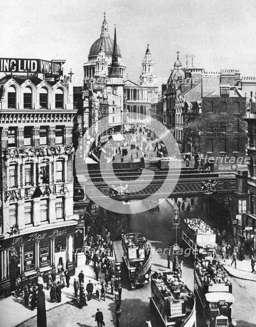 The spire of St Martin, Ludgate silhouetted against the bulk of St Paul's, London, 1926-1927. Artist: Frith