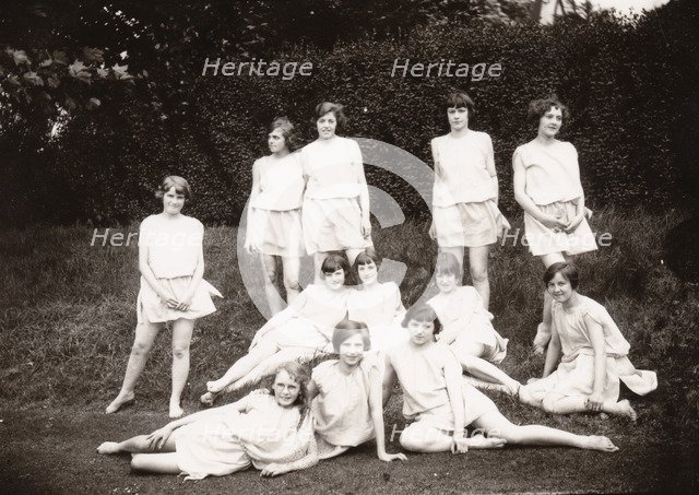 Girls Greek dancing class pose on lawn, 1929. Artist: Unknown