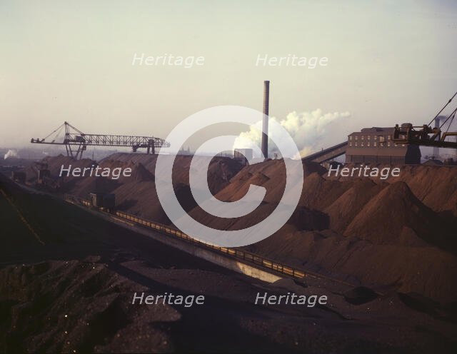 Hanna furnaces of the Great Lakes Steel Coporation, stock pile of coal and..., Detroit, Mich., 1942. Creator: Arthur S Siegel.