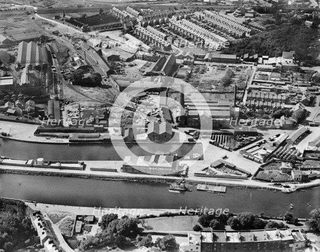 Sawmills and engineering works at the canal basin, Exeter, Devon, 1928. Artist: Aerofilms.