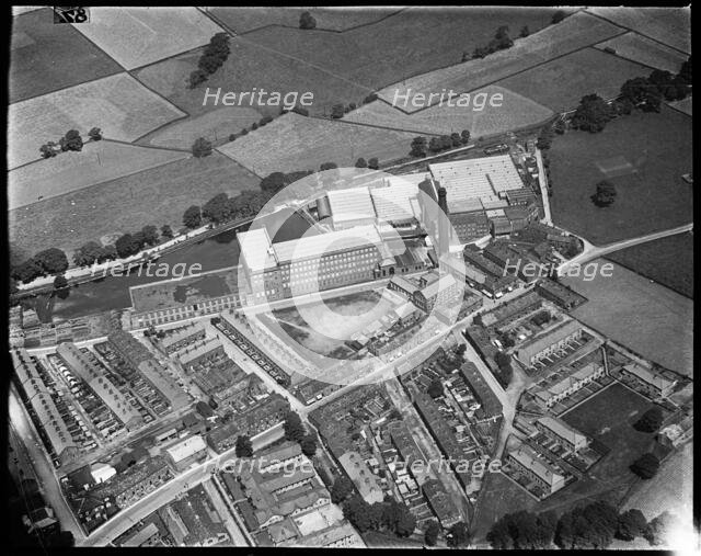 Sutton Worsted Mills on Bridge Street, Sutton-in-Craven, North Yorkshire, c1930s. Creator: Arthur William Hobart.