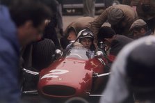 John Surtees in a Ferrari. Artist: Unknown