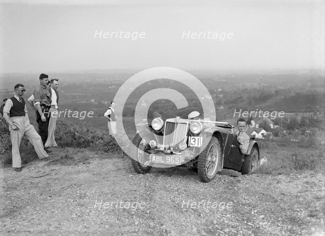 1936 MG TA of the Three Musketeers team taking part in the NWLMC Lawrence Cup Trial, 1937. Artist: Bill Brunell.
