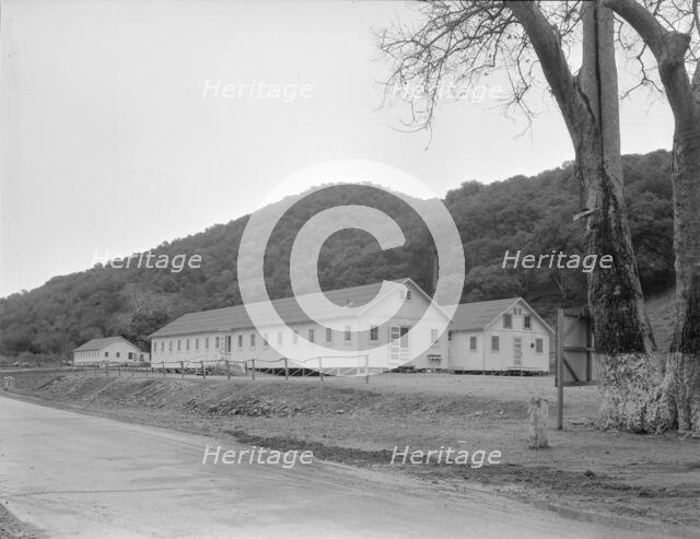 Dining hall, kitchen and hospital, Hot Springs federal shelter, California, 1936. Creator: Dorothea Lange.