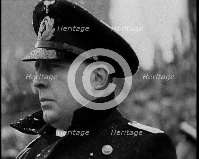 Man in Uniform Listening to a Speech, 1930s. Creator: British Pathe Ltd.