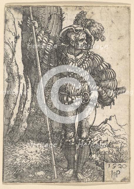 A Lansquenet Standing by a Tree, 1520. Creator: Sebald Beham.