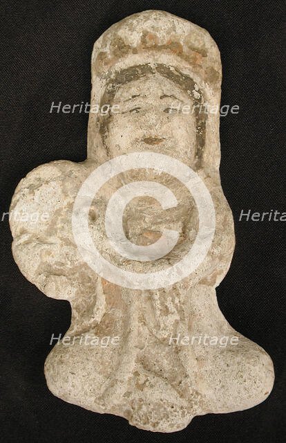 Seated tambourine player, Iran, 12th century. Creator: Unknown.