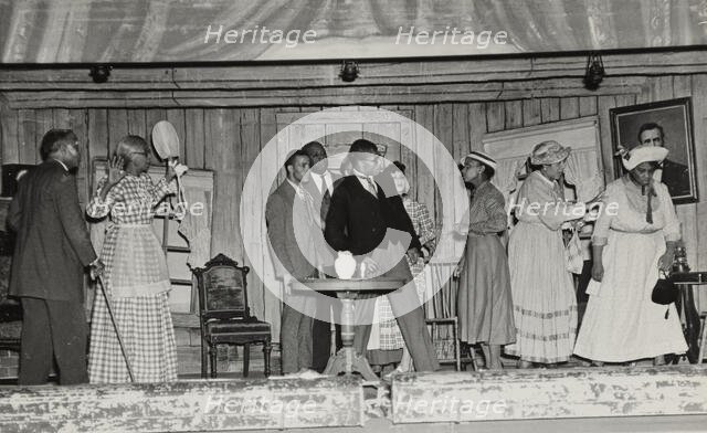 Scene with nine people, 1937. Creator: Unknown.