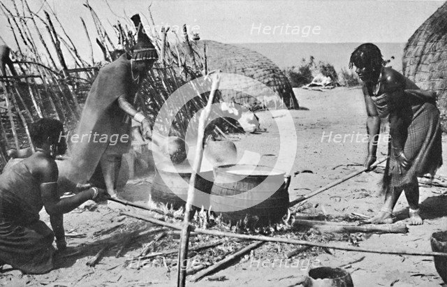 Zulu wives brewing utshwala (beer), Natal, 1912. Artist: Unknown.