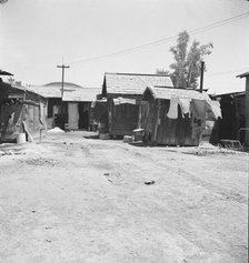 Homes of Mexican field workers, Brawley, Imperial Valley, California, 1935. Creator: Dorothea Lange.