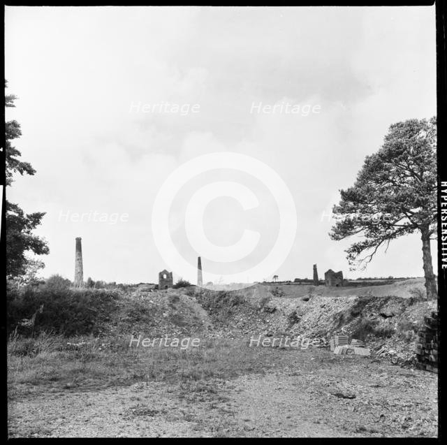 Industrial landscape with abandoned mine engine houses and chimneys, Tamar Valley, Cornwall, 1967. Creator: Eileen Deste.