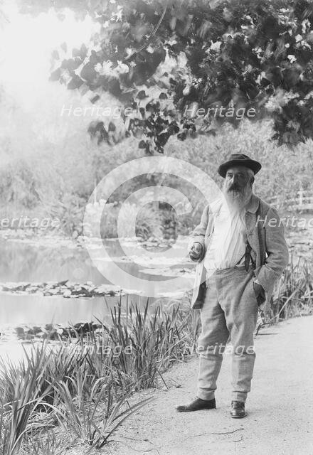 Claude Monet near the Water Lily Pond, 1905. Creator: Bulloz, Jacques-Ernest (1858-1942).
