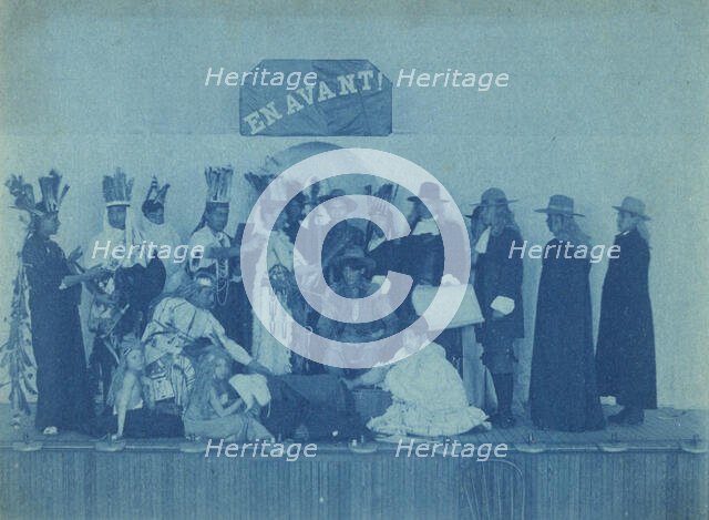 Pageant participants costumed as Pilgrims and Natives, posed beneath a banner "En..., c1880 - 1900. Creator: Frances Benjamin Johnston.