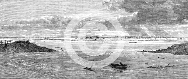 The Flood in the Fens: the breach in the bank, three miles and a half above the sluice, 1862. Creator: Unknown.