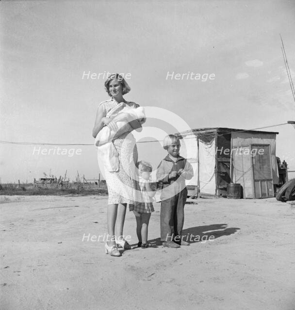 Family of rural rehabilitation client, Tulare County, California, 1938. Creator: Dorothea Lange.