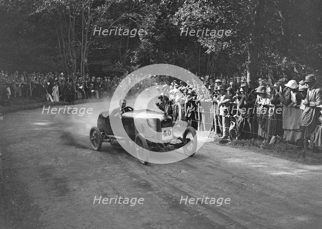 Unidentified open 4-seater competing in the MAC Shelsley Walsh Hillclimb, Worcestershire, 1923. Artist: Bill Brunell.