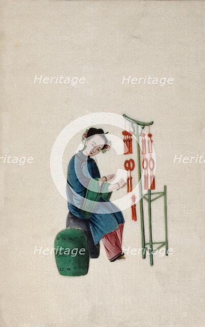 A woman displaying good luck tassels for sale, 1800. Creator: Unknown.