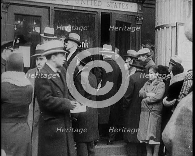 Unemployed People Gathering on the Streets , 1929. Creator: British Pathe Ltd.