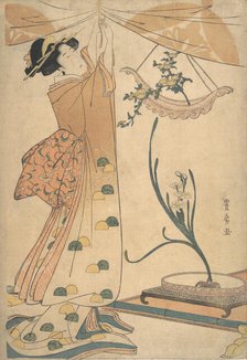 A Woman Tying up a Curtain, a Flower Arrangement of Chrysanthemums in a Boat-shaped Ha..., ca. 1805. Creator: Utagawa Toyohiro.