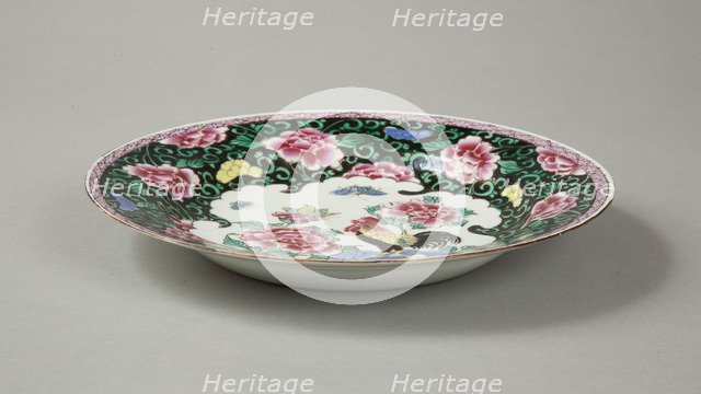 European copy of famille noire plate with cockerel looking at a butterfly, 20th century. Artist: Unknown.