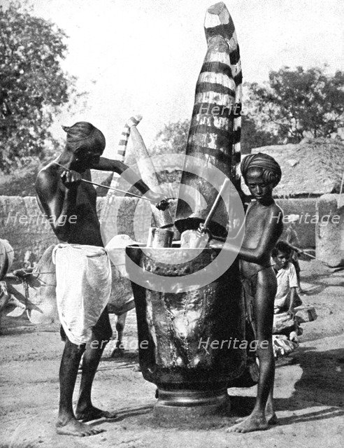 Sesame mill painted in honour of a Hindu goddess, India, 1936. Artist: Ewing Galloway