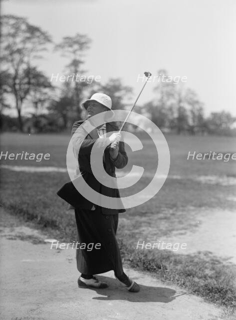 Mrs. Mann Playing Golf, 1916. Creator: Harris & Ewing.