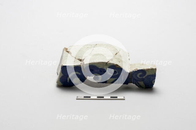 Fragment of an underglaze cobalt-blue-painted wall tile, (18th century?). Creator: Unknown.