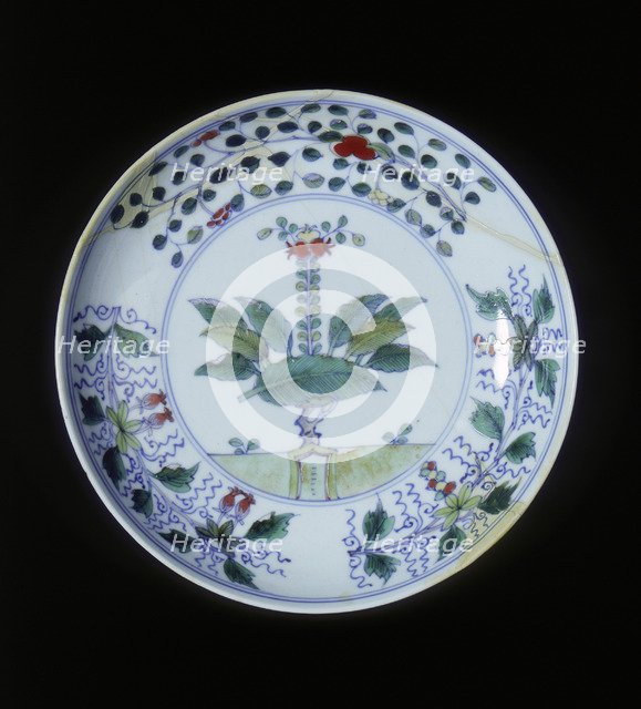 Doucai plate with pomegranate tree and floral groups, Qing dynasty, China, 1700-1722. Artist: Unknown