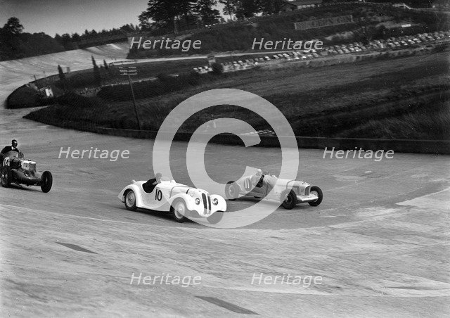 MG K3, Frazer-Nash BMW and Alvis cars racing at Brooklands. Artist: Bill Brunell.
