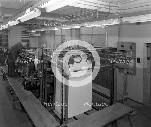 Meilhe two colour printing machine in operation at a printers, Mexborough, South Yorkshire, 1959. Artist: Michael Walters