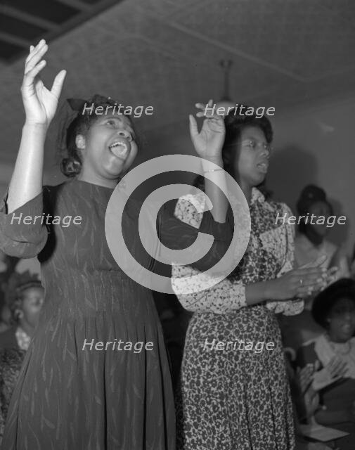 Members of the congregation of the Church of God in Christ, Washington, D.C., 1942. Creator: Gordon Parks.