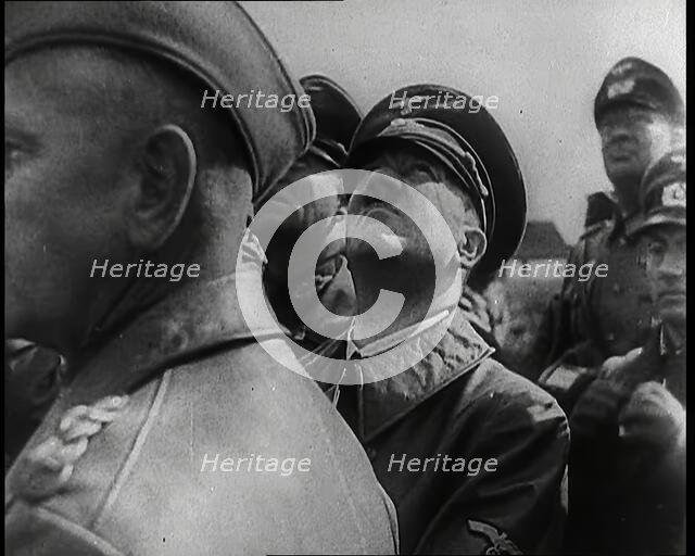 Adolf Hitler Standing With a Group of Other Male German Military Commanders and Looking Upwards,1939 Creator: British Pathe Ltd.