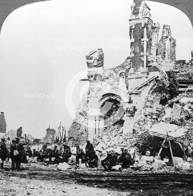 German prisoners of war beside the ruins of the basilica of Albert, France, World War I, 1914-1918.Artist: Realistic Travels Publishers