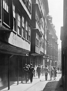 People walking down Temple Lane, Westminster, London. Artist: Unknown