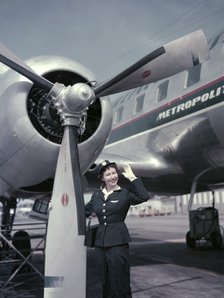 Air hostess in front of the first Convair CV-440 Metropolitan aircraft in Sweden, 1956. Artist: Göran Algård