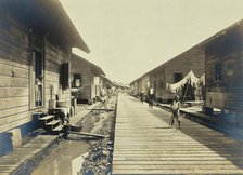 Panama Canal workers' (West Indian and Panaman) quarters: exterior view of wooden huts..., c1910. Creator: Unknown.