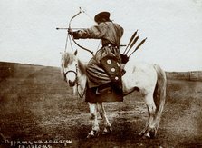 Buryat on horseback with bow, 1895-1939. Creator: L Veniukov.