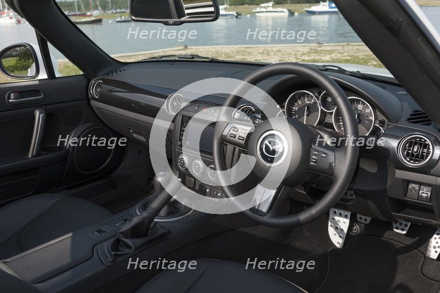 2014 Mazda MX5 Roadster Coupe Artist: Unknown.