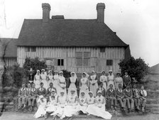 Soldiers and nurses at Great Dixter, East Sussex, 1918. Artist: Nathaniel Lloyd