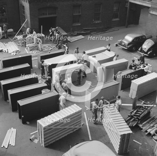 Possibly: United States government workers and carpenters making crates..., Washington, D.C., 1942. Creator: Gordon Parks.