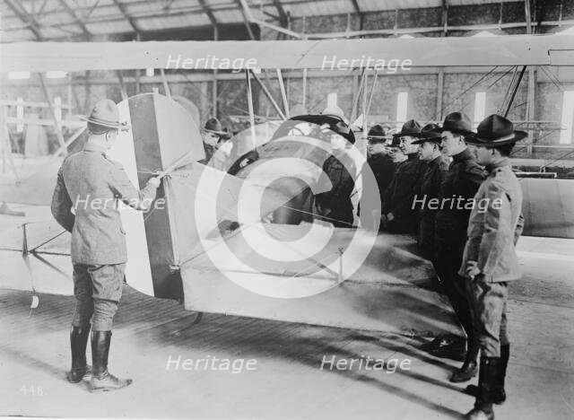 Studying aeroplane [i.e. airplane] rudder, 1917 or 1918. Creator: Bain News Service.