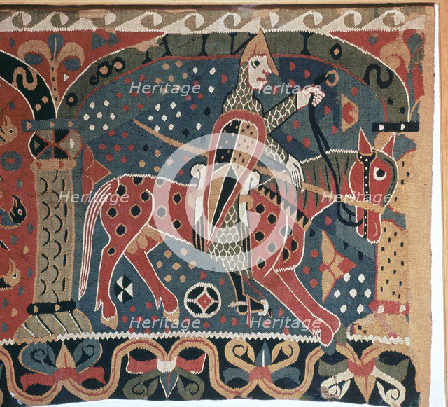Tapestry fragment showing a Viking horseman. Artist: Unknown