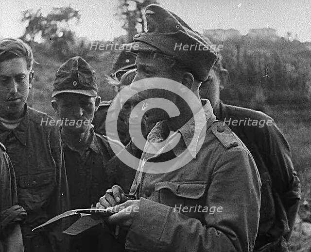 A German Prisoner of War Writing Details Down, 1943-1944. Creator: British Pathe Ltd.