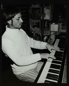 Michael Garrick playing the piano at The Bell, Codicote, Hertfordshire, 4 January 1981. Artist: Denis Williams