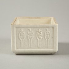 Soft paste rectangular vessel with characters in relief, early 19th century. Artist: Unknown.