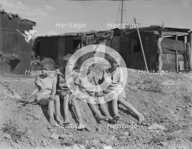 Children of migrant cotton field workers from Sweetwater, Oklahoma, 1937. Creator: Dorothea Lange.