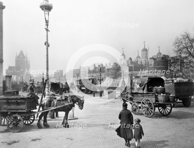 Carts outside the Tower of London, c1930. Artist: George Davison Reid