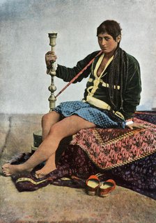 'Persane Fumant Le Kalgan', (Persian woman smoking in Kalgan), 1900. Creator: Unknown.